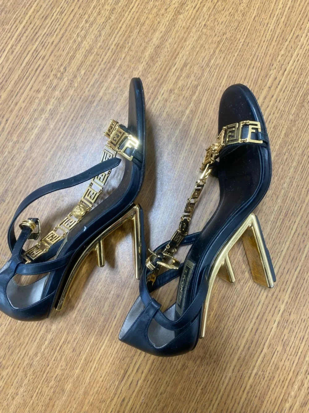 Fendi First Fendace  Black Leather T-Strap Heels with Gold Medusa Chain
